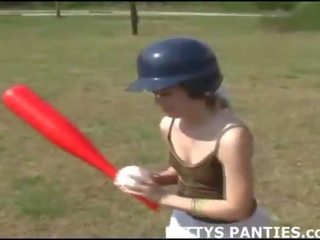 Innocent 18yo teen playing baseball outdoors